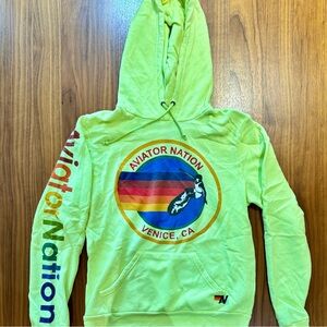 AVIATOR NATION Graphic Print Crew Neck Hoodie in neon yellow.